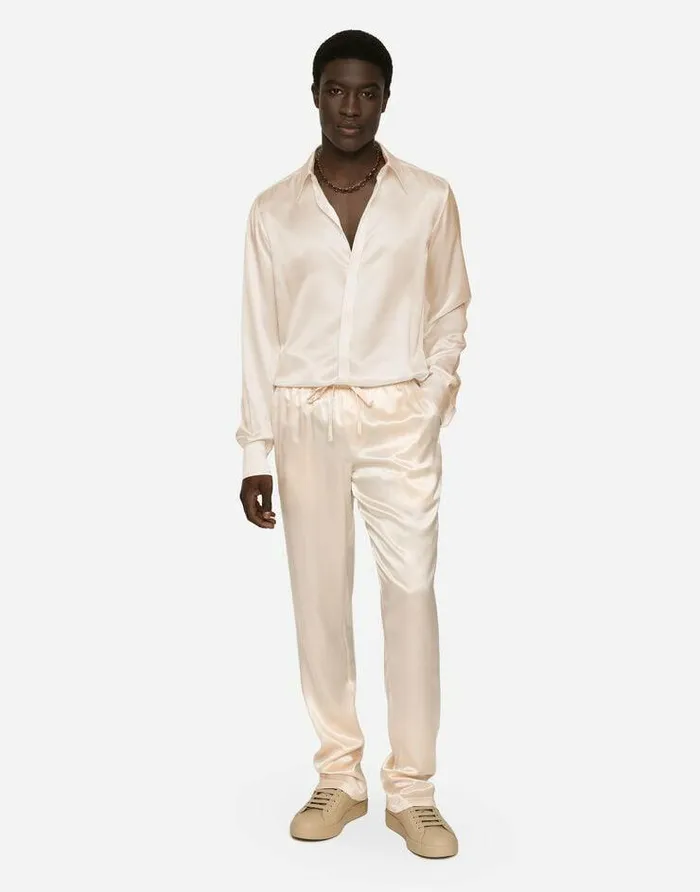 Dolce and Gabbana Trousers And Shorts Men Silk Satin Jogging Pants With Metal DG Logo Pale Pink Dolce and Gabbana Trousers And Shorts Men Silk Satin Jogging Pants With Metal DG Logo Pale Pink