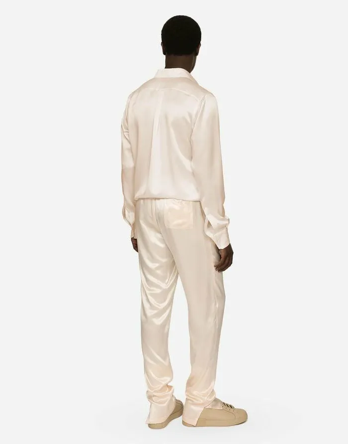 Dolce and Gabbana Trousers And Shorts Men Silk Satin Jogging Pants With Metal DG Logo Pale Pink Dolce and Gabbana Trousers And Shorts Men Silk Satin Jogging Pants With Metal DG Logo Pale Pink