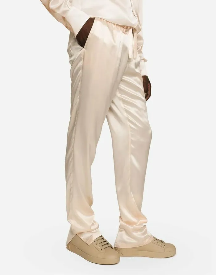 Dolce and Gabbana Trousers And Shorts Men Silk Satin Jogging Pants With Metal DG Logo Pale Pink Dolce and Gabbana Trousers And Shorts Men Silk Satin Jogging Pants With Metal DG Logo Pale Pink
