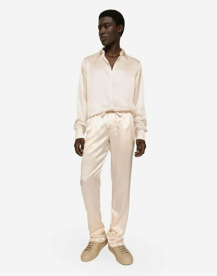 Dolce and Gabbana Trousers And Shorts Men Silk Satin Jogging Pants With Metal DG Logo Pale Pink Dolce and Gabbana Trousers And Shorts Men Silk Satin Jogging Pants With Metal DG Logo Pale Pink