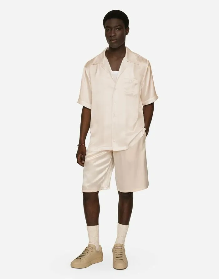 Dolce and Gabbana Trousers And Shorts Men Silk Satin Jogging Shorts With Metal DG Logo Pale Pink Dolce and Gabbana Trousers And Shorts Men Silk Satin Jogging Shorts With Metal DG Logo Pale Pink