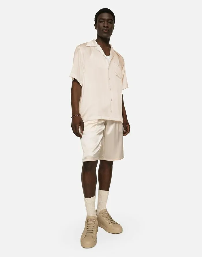 Dolce and Gabbana Trousers And Shorts Men Silk Satin Jogging Shorts With Metal DG Logo Pale Pink Dolce and Gabbana Trousers And Shorts Men Silk Satin Jogging Shorts With Metal DG Logo Pale Pink
