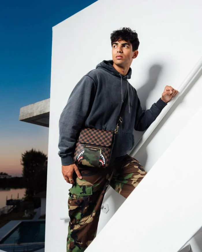 SPRAYGROUND EXTERIOR GOLD ZIP POCKET SHARKS IN PARIS MESSENGER SLING BAG Bags