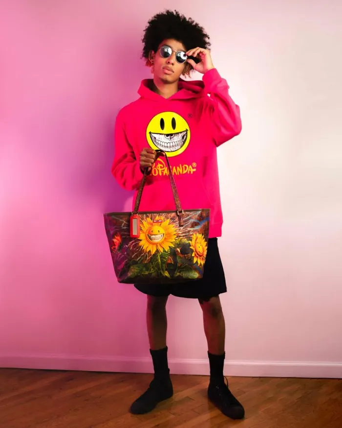 SPRAYGROUND SUNFLOWER GRIN RON ENGLISH COLLAB TOTE Bags