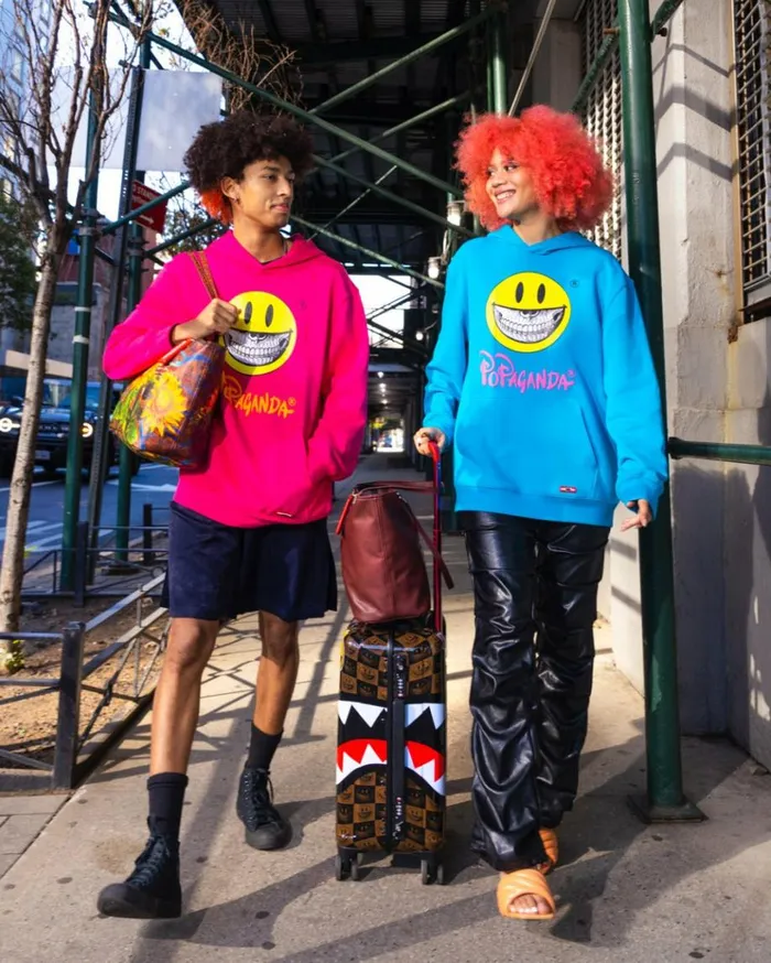 SPRAYGROUND SUNFLOWER GRIN RON ENGLISH COLLAB TOTE Bags