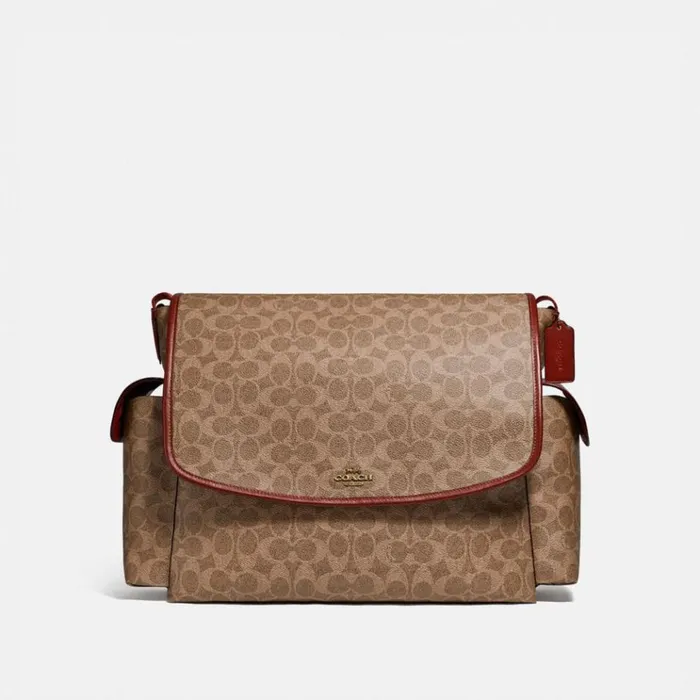 Women Tech and Travel Coach Baby Messenger Bag In Signature Canvas Brasstanrust Women Tech and Travel Coach Baby Messenger Bag In Signature Canvas Brasstanrust