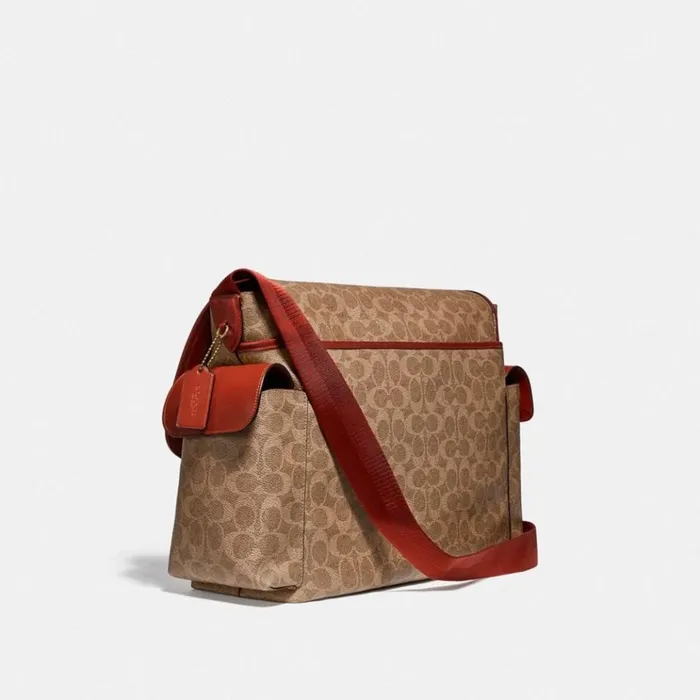 Women Tech and Travel Coach Baby Messenger Bag In Signature Canvas Brasstanrust Women Tech and Travel Coach Baby Messenger Bag In Signature Canvas Brasstanrust