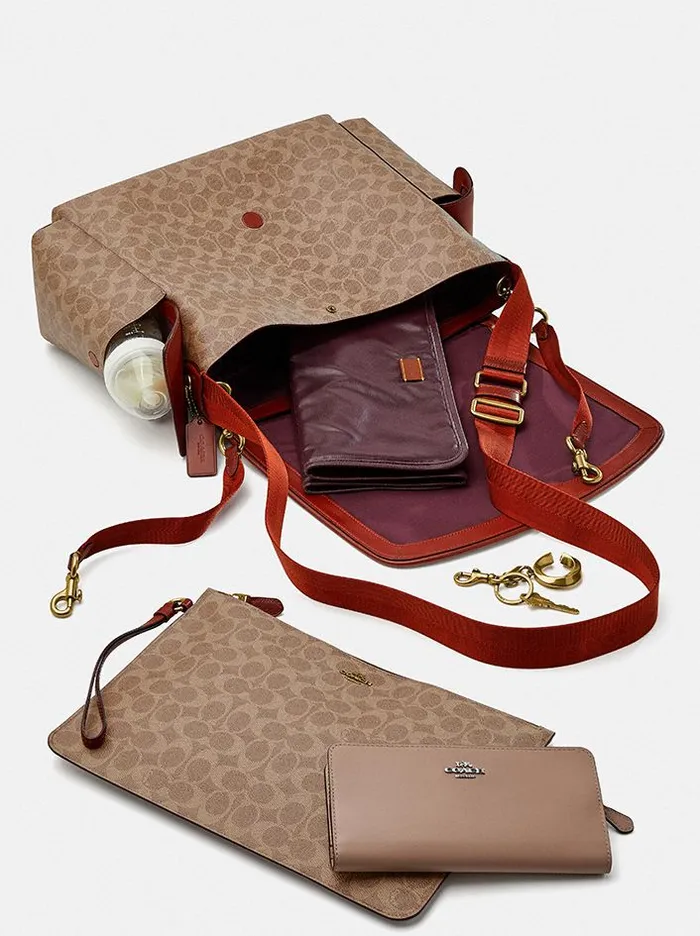 Women Tech and Travel Coach Baby Messenger Bag In Signature Canvas Brasstanrust Women Tech and Travel Coach Baby Messenger Bag In Signature Canvas Brasstanrust