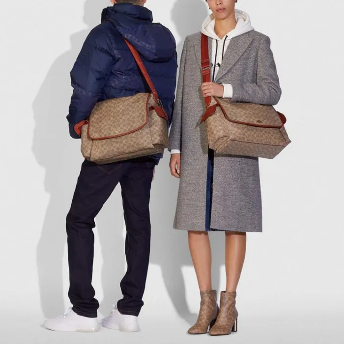 Women Tech and Travel Coach Baby Messenger Bag In Signature Canvas Brasstanrust Women Tech and Travel Coach Baby Messenger Bag In Signature Canvas Brasstanrust